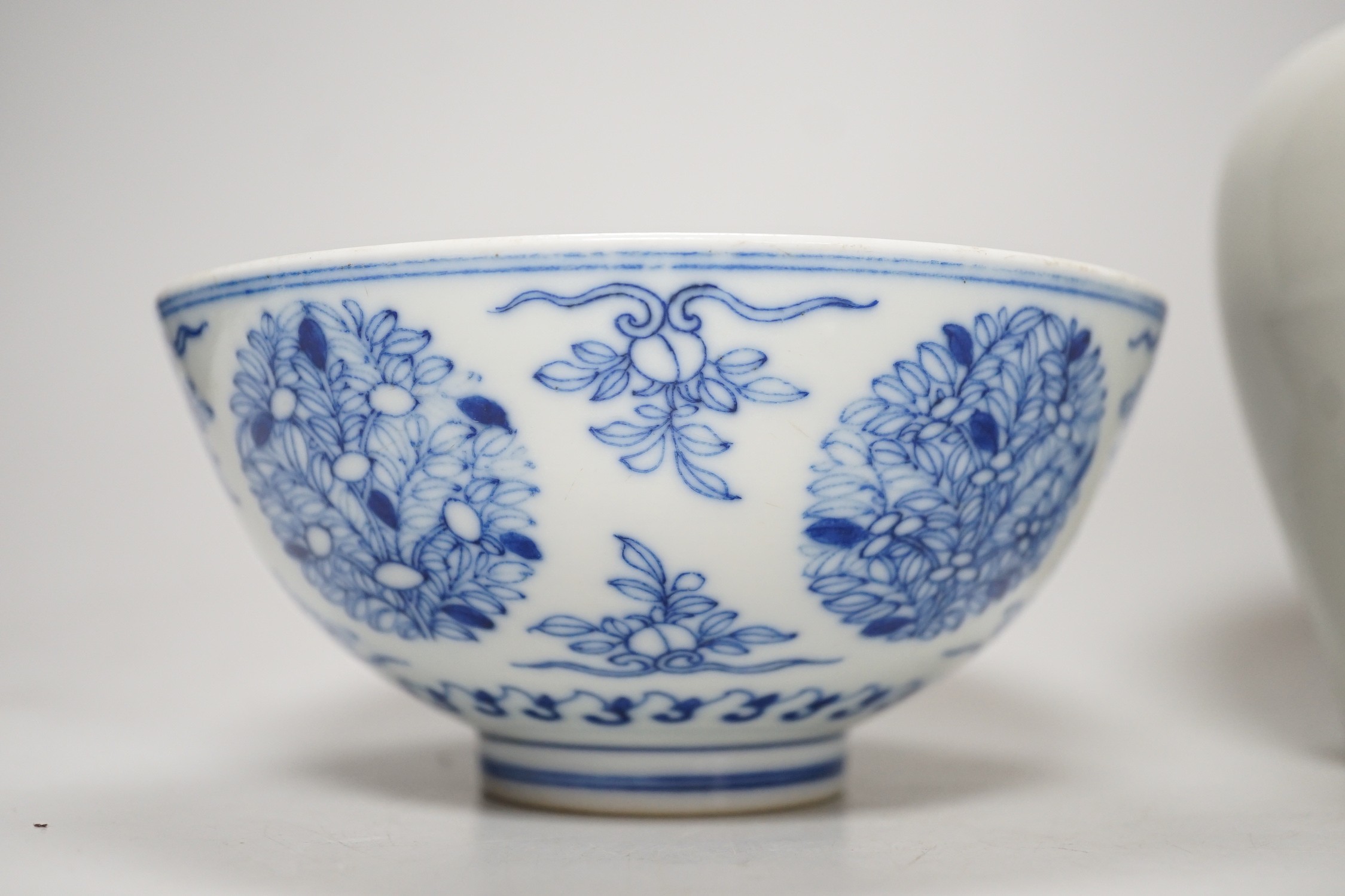 A Chinese underglaze copper red meiping a.f. and a Chinese blue and white bowl. Tallest 15cm